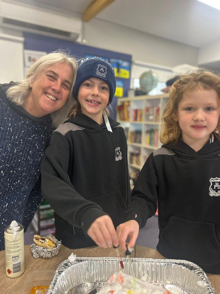 May be an image of 3 people